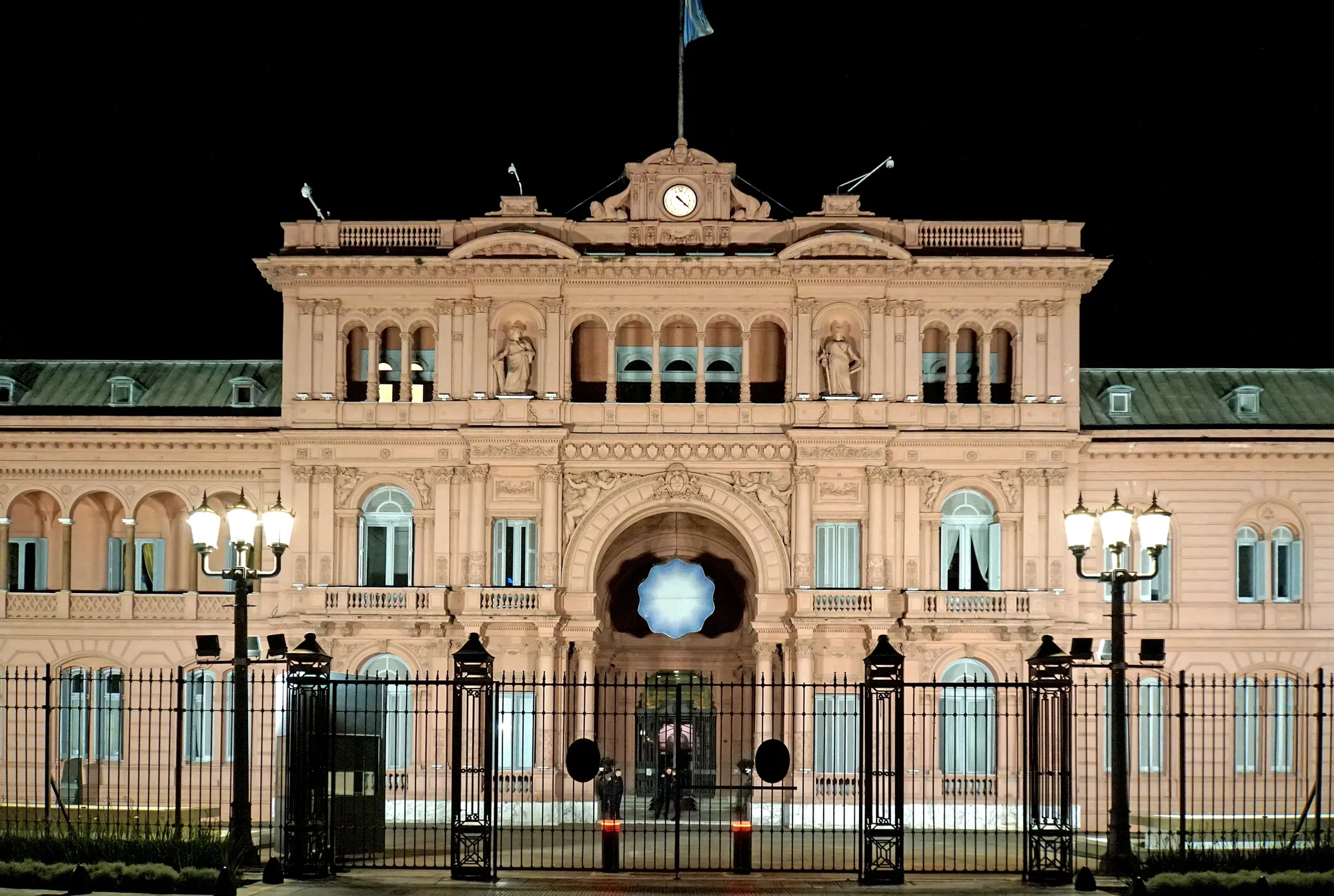 Casa Rosada illuminated at night, seat of the Argentinian government in Buenos Aires.