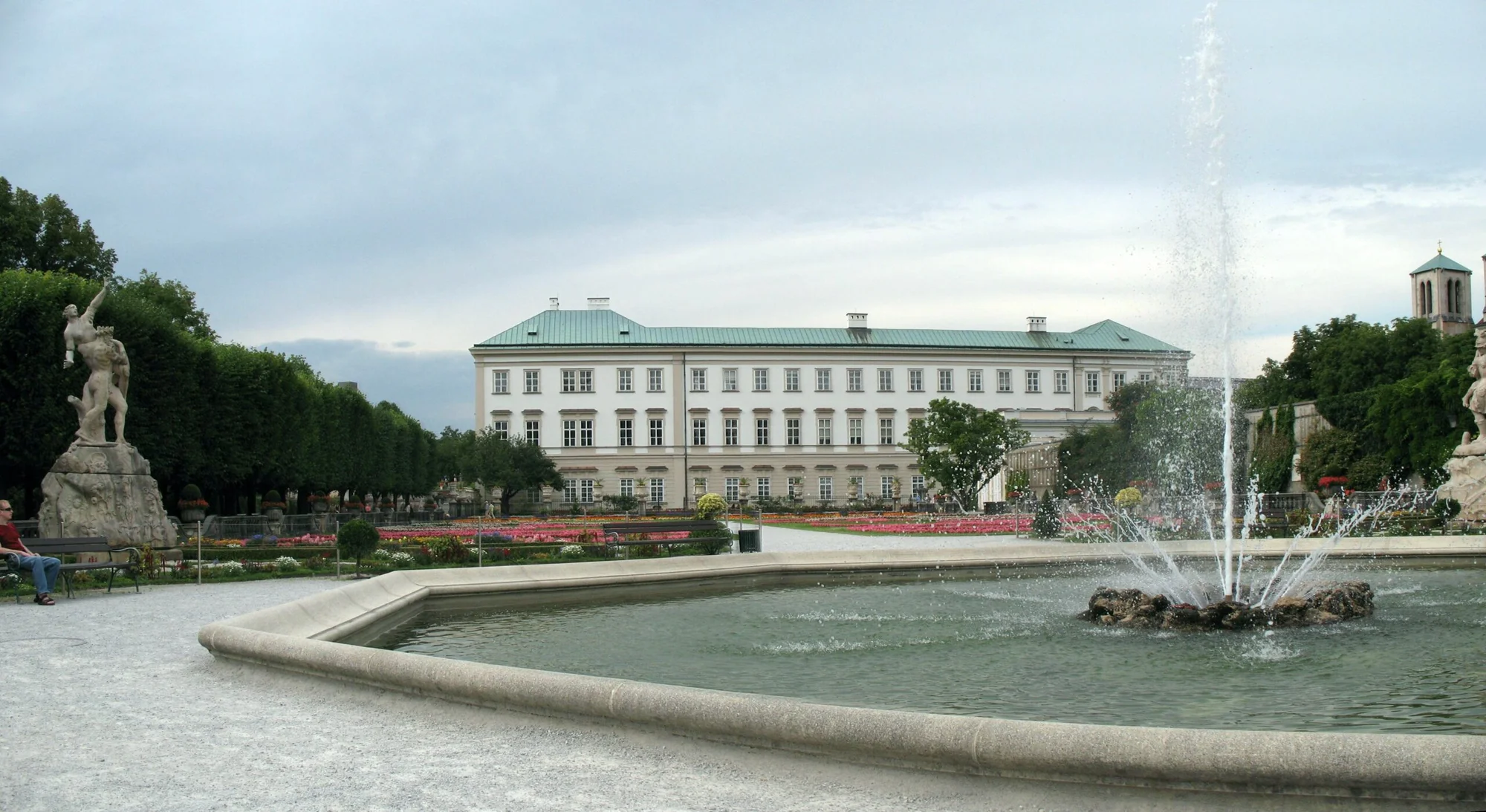 Schloss Mirabell and ornamental garden with fountain in Salzburg, Austria.