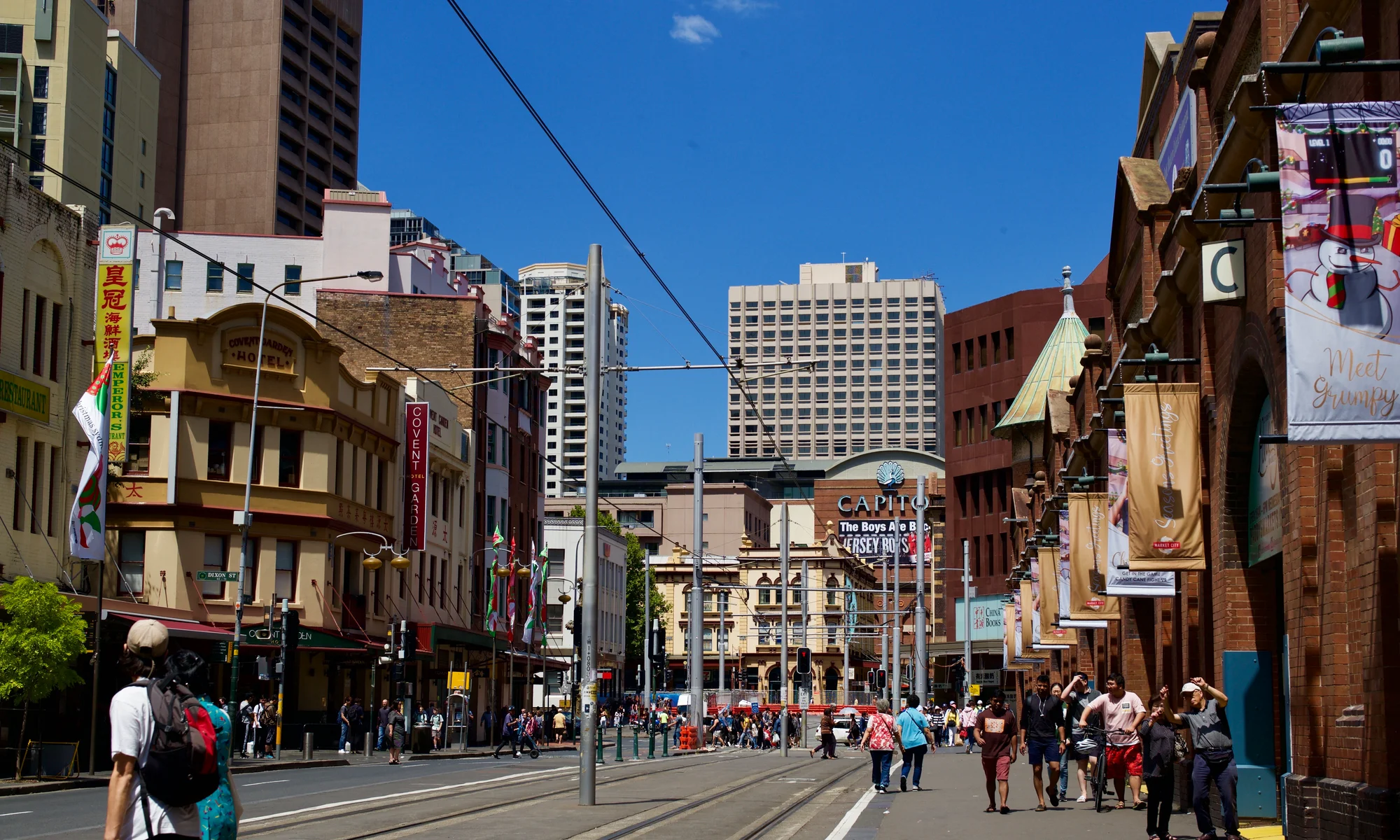 Vibrant streets of Chinatown Sydney with historic buildings and social activity in Australia.