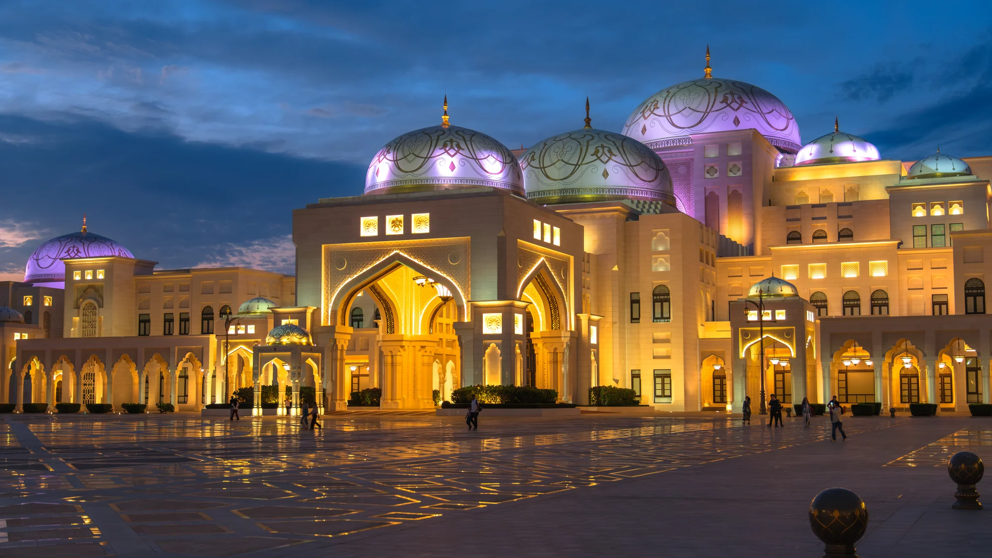 Qasr Al Watan Palace lit up at night, a magnificent example of architecture in Abu Dhabi.