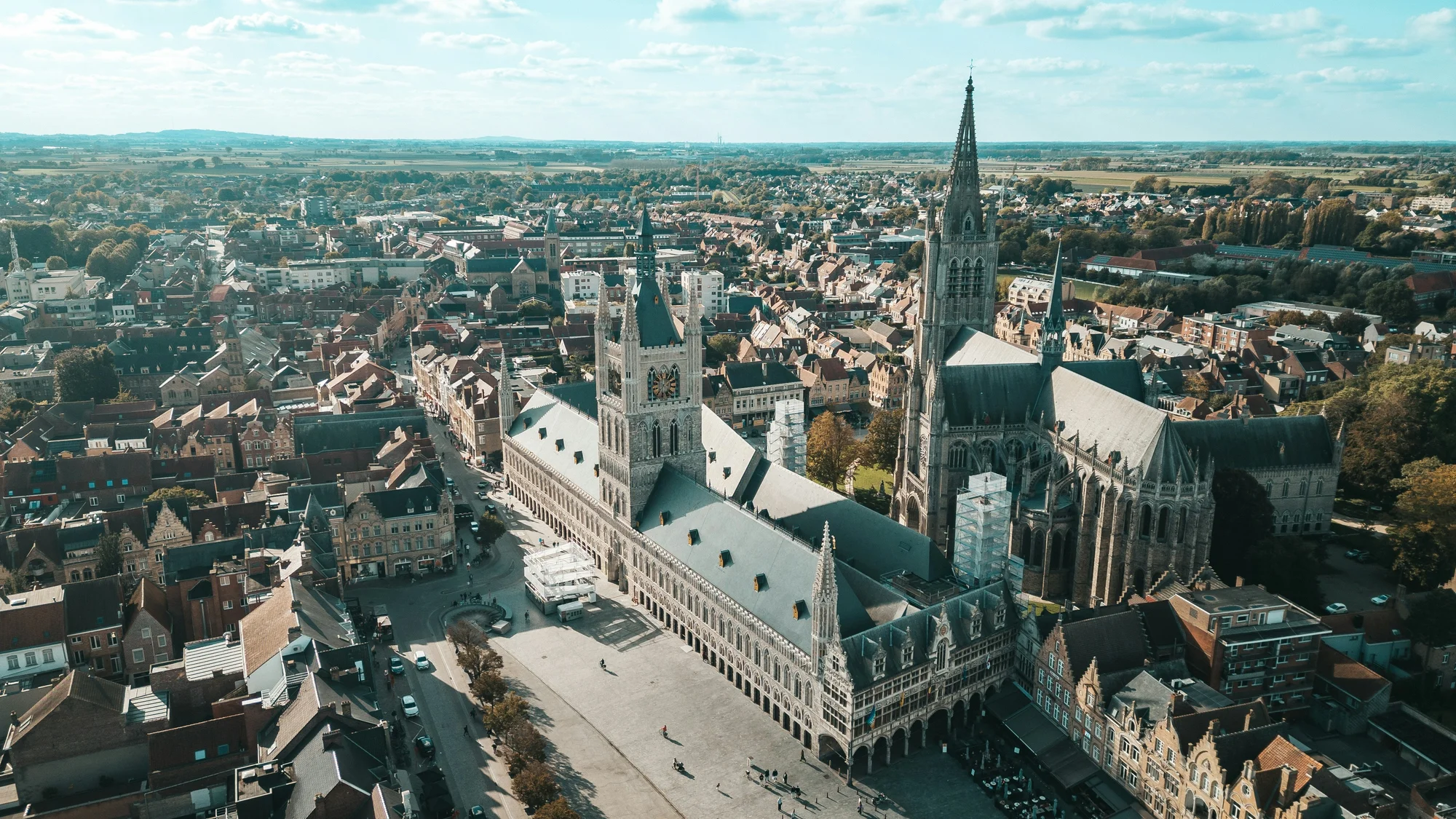 Aerial view of historic buildings in Ypres, Belgium, showcasing Gothic architecture