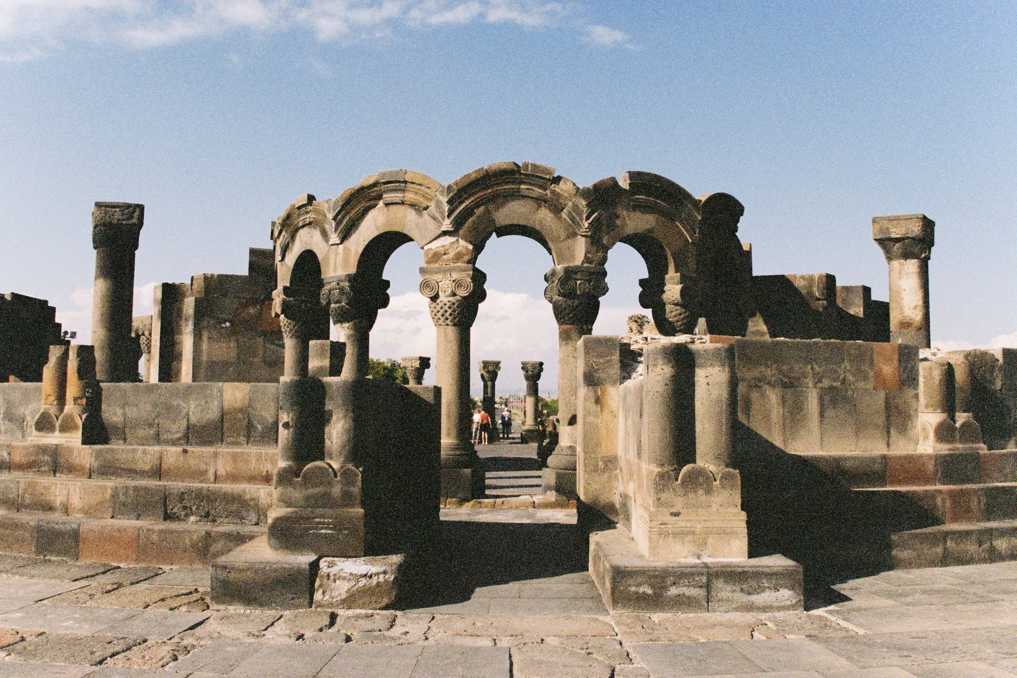 Ruins of Zvartnots Cathedral under a clear sky in Vagharshapat, Armenia