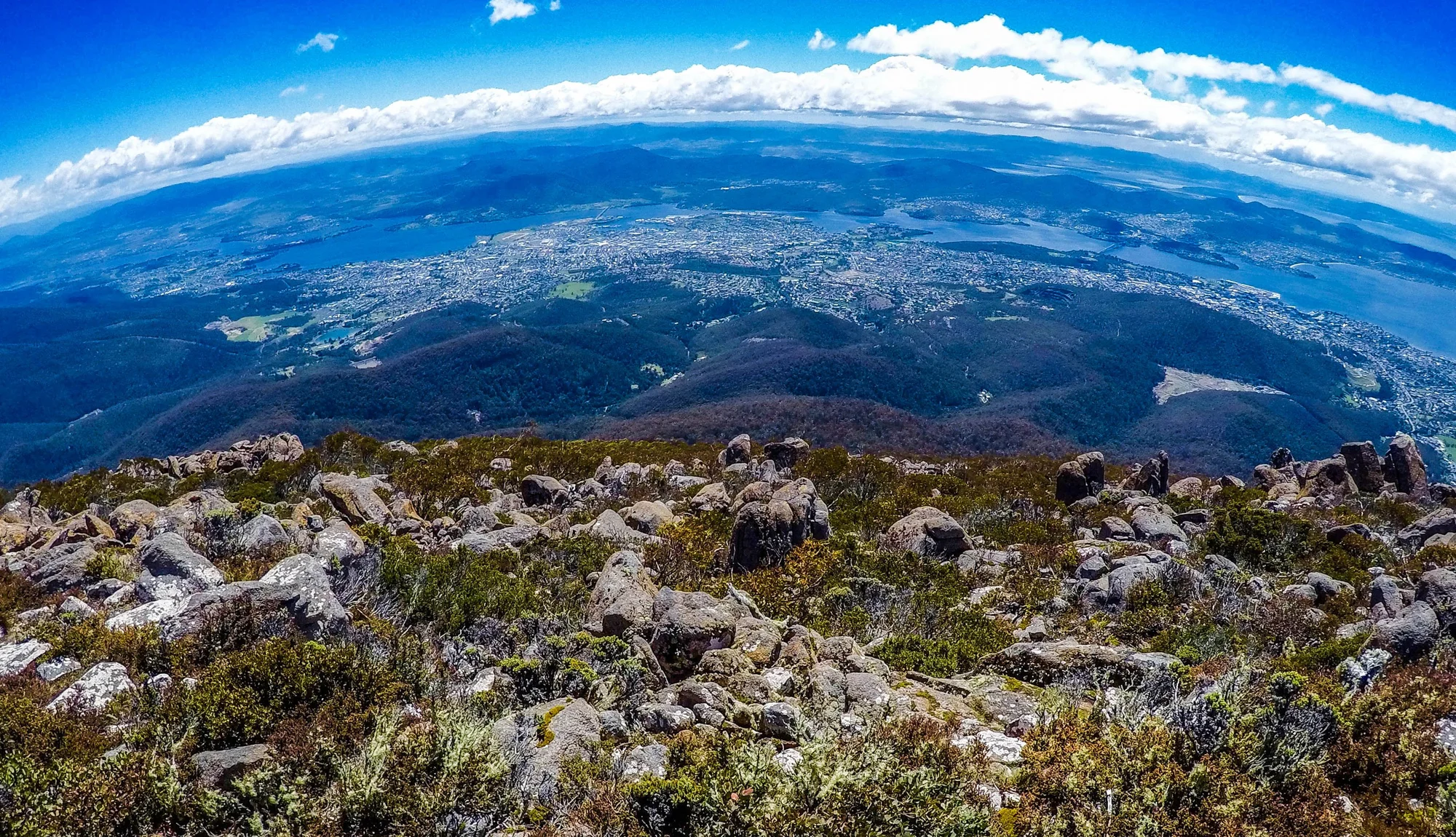 Panorama from Mount Wellington showing Hobart city and natural landscapes.