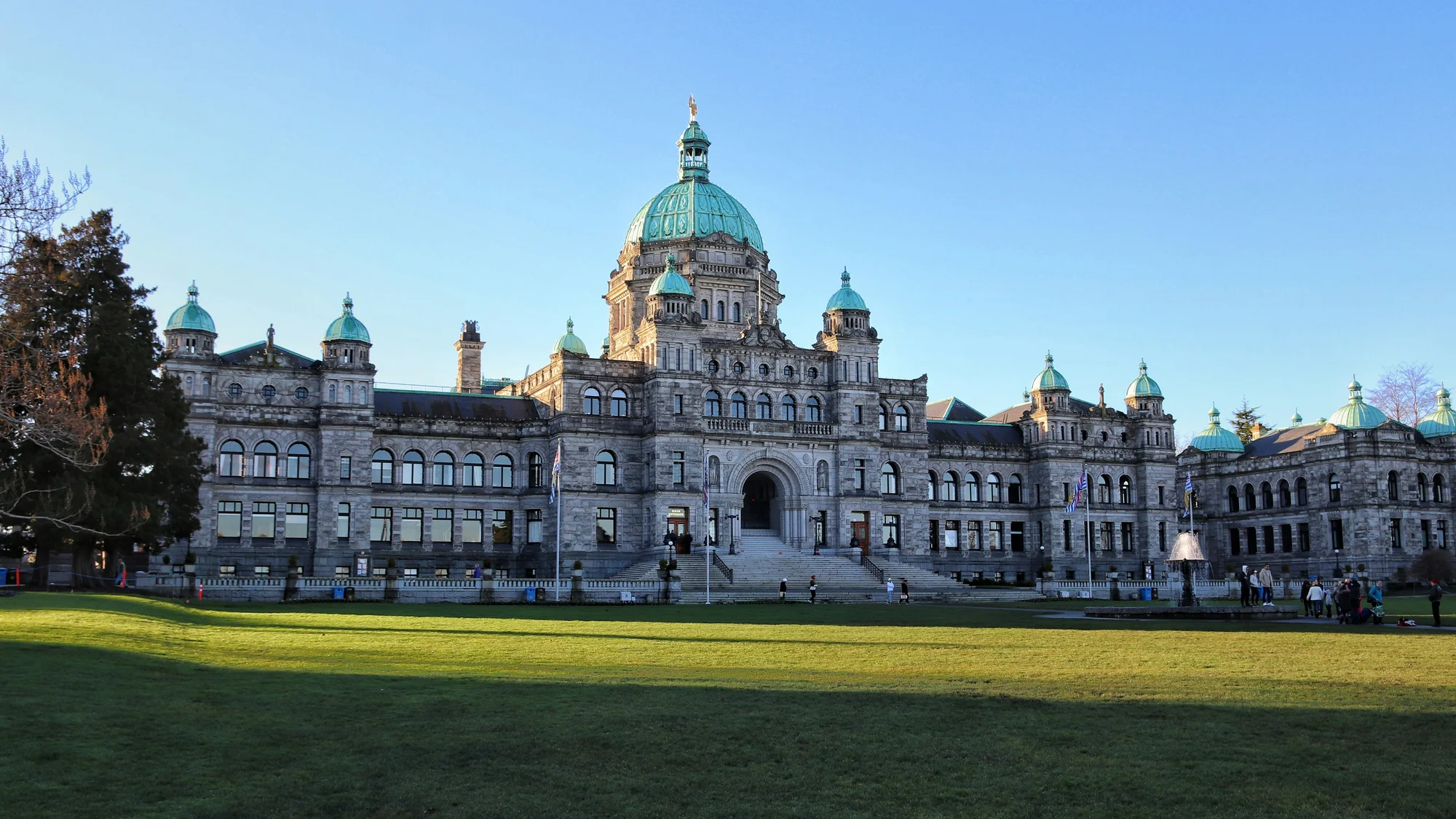Legislative Building in Victoria, British Columbia, surrounded by greenery.