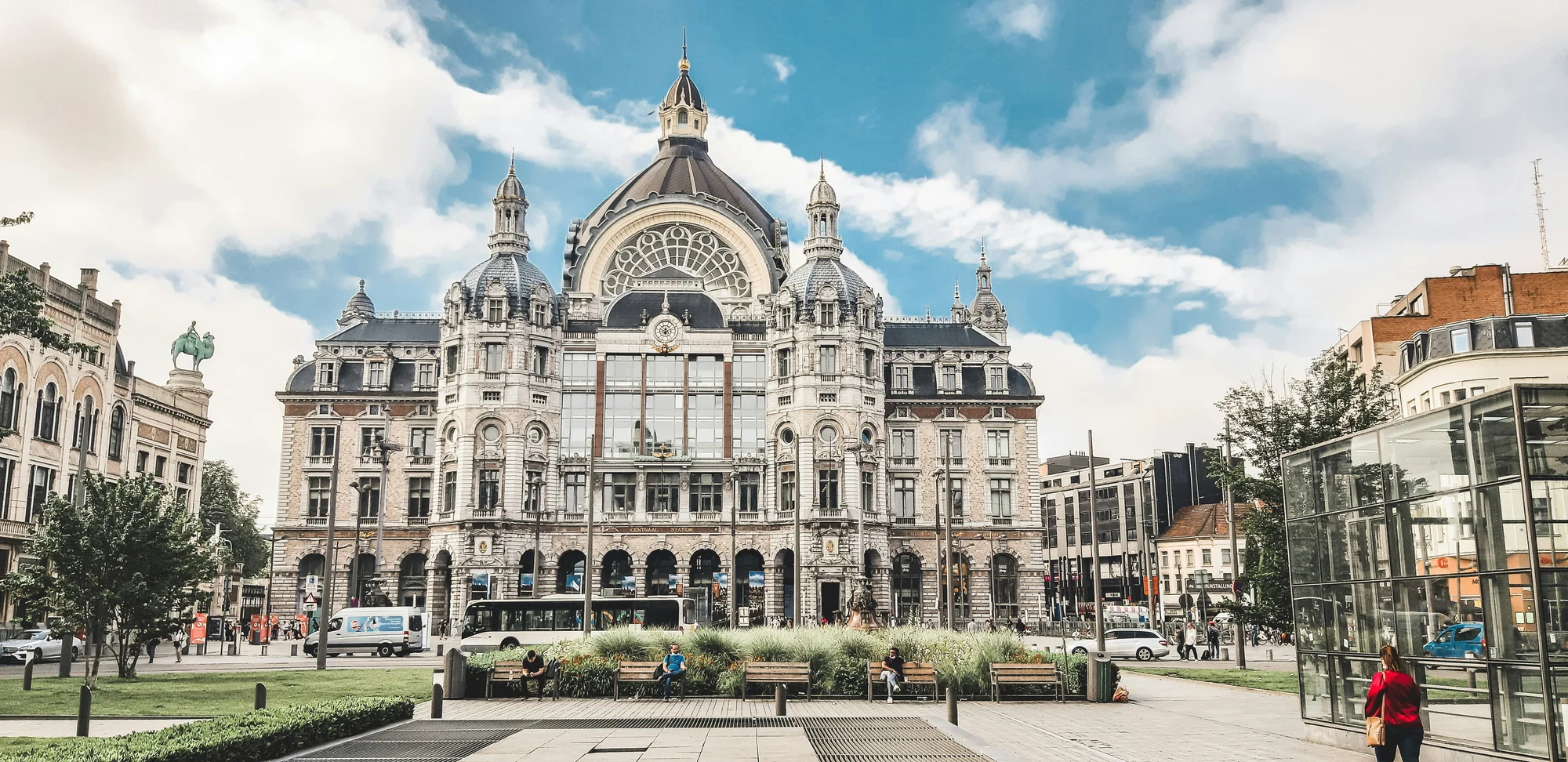 Main entrance photo of Antwerp Central Station, Belgium, under clear skies.